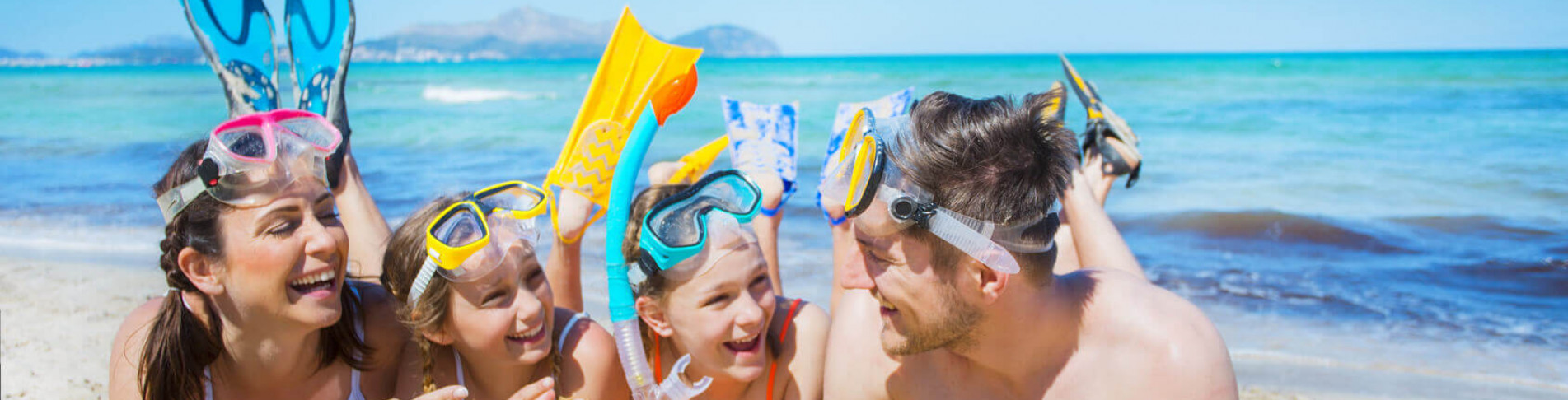 Glückliche Familie am Strand